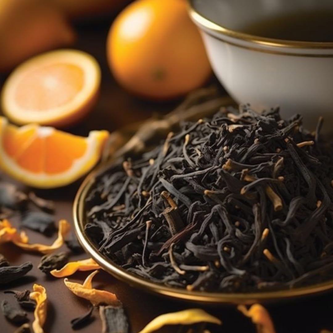 Earl Grey orange tea served hot with citrus garnish in background.