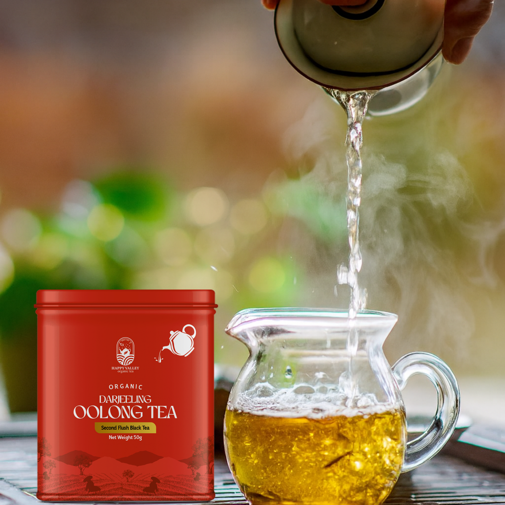 Organic Darjeeling oolong tea being poured into glass cup