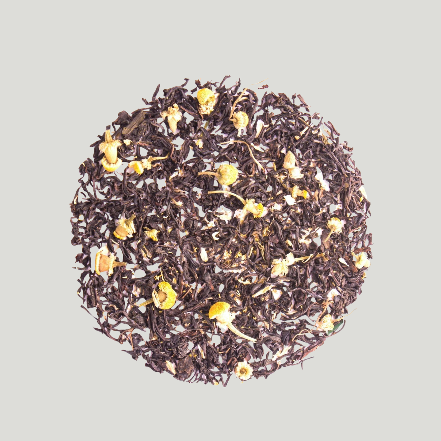 Loose leaf Darjeeling black tea blended with chamomile flowers.