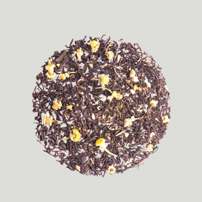 Loose leaf Darjeeling black tea blended with chamomile flowers.